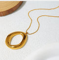 Gold Tone Organic Circle Pendant Necklace
